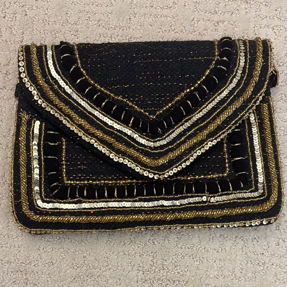 America & beyond Elegant Black and Gold Clutch. New